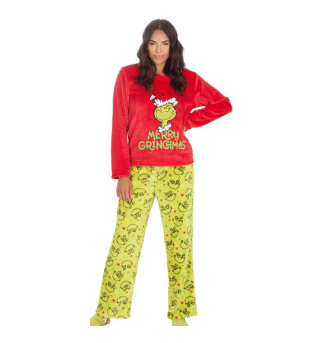 A woman wearing Christmas grinch fleece lounge pyjama set